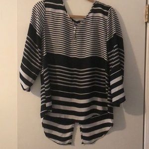 Black and white striped top with split back